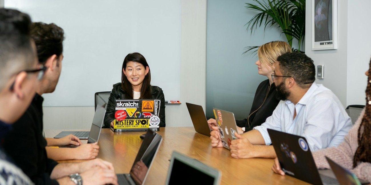 people in a meeting discussing app development