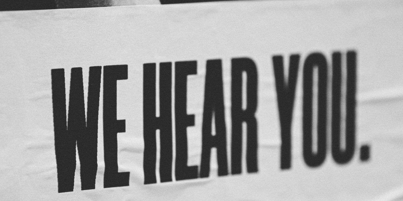 banner reading we hear you